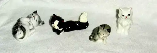 7 kleine Deko-Katzenfiguren ohne Marke