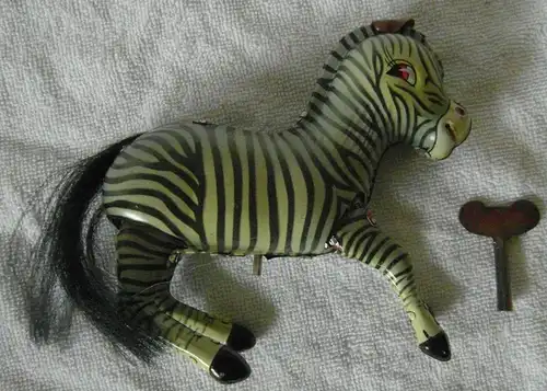 Blechspielzeug, „Jumping Zebra“, mit Federantrieb, in Originalschachtel