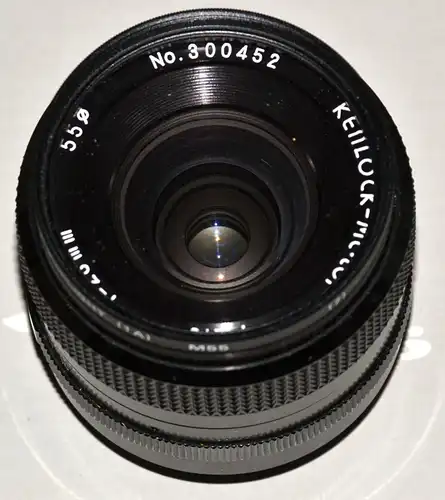 Objektiv,Kenlock-Mc.tor,1:2.8,f=28 mm,Ø 55,Weitwinkel,für Konica und Nikon