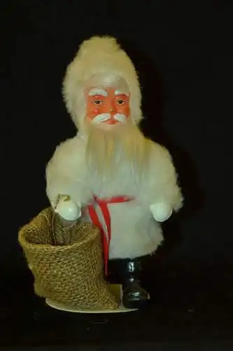 Nikolaus Figur,Kunststoff, Mitte des 20. Jhdt. weißer Mantel,leerer Sack19 cm