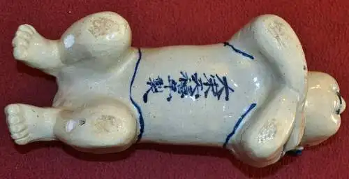 Chinesische Kopfstüze,graue Keramik mit blauer Dekoration,wohl um 1900
