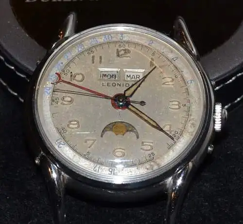Herrenarmbanduhr, Leonidas,Mondphase+Kalendarium,Stahl,ca 1950, ohne Band