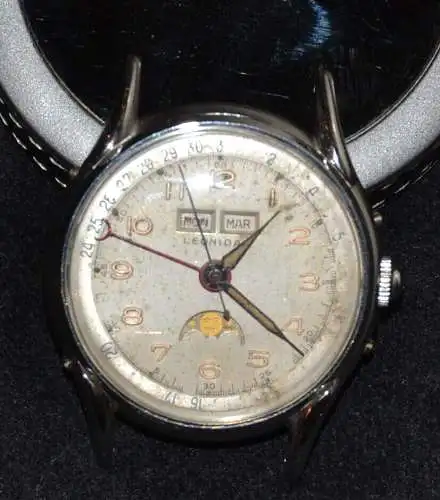 Herrenarmbanduhr, Leonidas,Mondphase+Kalendarium,Stahl,ca 1950, ohne Band