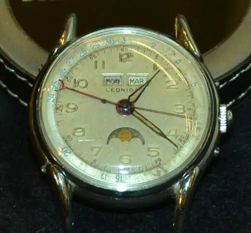 Herrenarmbanduhr, Leonidas,Mondphase+Kalendarium,Stahl,ca 1950, ohne Band