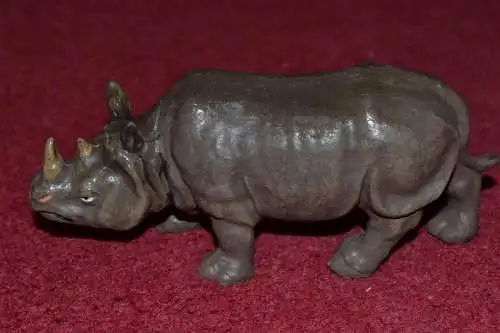 Spielzeugfigur, Tierfigur aus Masse, etwa 1930,Nashorn, handbemalt