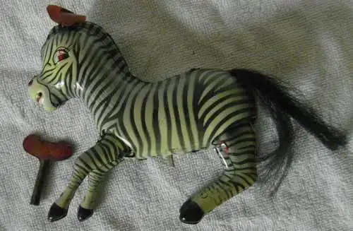Blechspielzeug, „Jumping Zebra“, mit Federantrieb, in Originalschachtel 