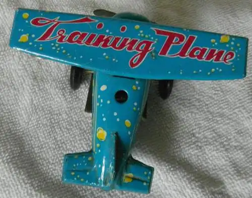 Blechspielzeug Propellerflugzeug "Training Plane" mit Federaufzug 