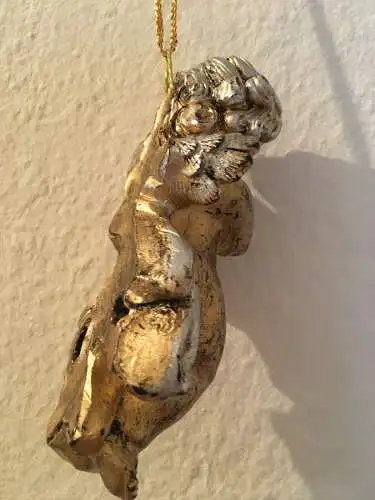 Weihnachtsschmuck, Engel mit Musiknoten, aus Plastik, 20 Jhdt