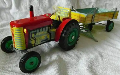  Traktor mit Anhänger in Originalkarton mit Federwerkantrieb