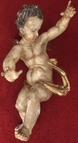 Holzgeschnitzter gefaßter Putto um 1800, beschädigt