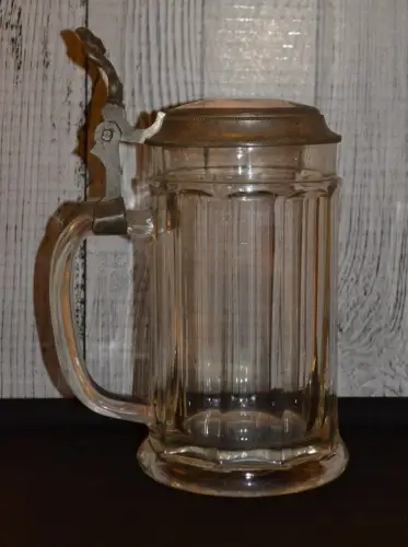 Bierkrug, Busserl, 0,5 L, Glas, Zinndeckel mit Porzellanmedaillon-beschädigt