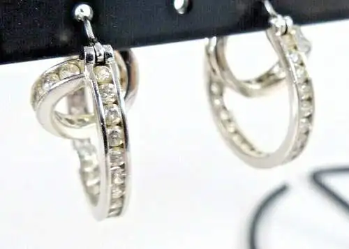 Ohrringe aus 925 Silber mit weißen Steinen           