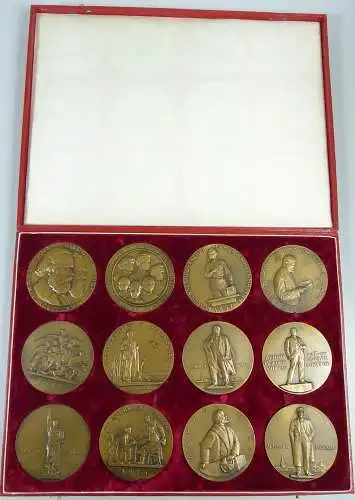 seltene Schatulle mit 12 Medaillen Bronze signiert M. Maniser über Lenin