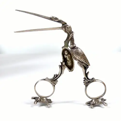 Nabelschnurschere 800 Silber Storch mit  inseitig relifiertes Wickelkind