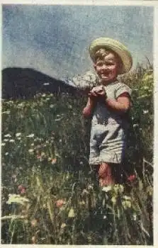 Junge in einer Wiese * ca. 1950