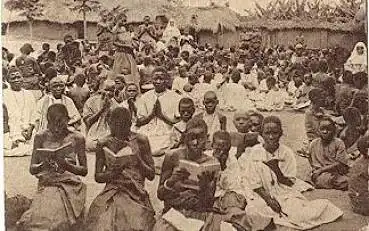 farbige Menschen beten Kathechismus gebr. ca.1920