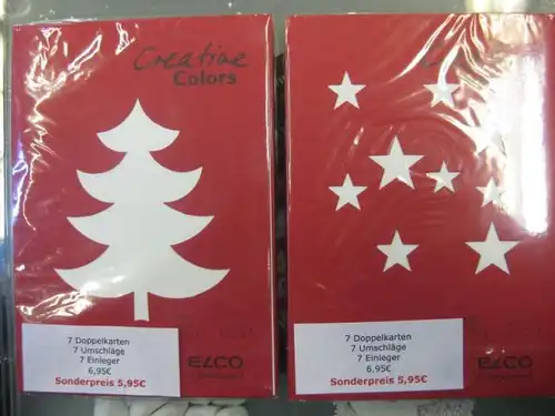 Weihnachtskarten, 2 x 7 Stück, mittelrot
Motiv Tannenbaum und Sterne, Stanztechnik