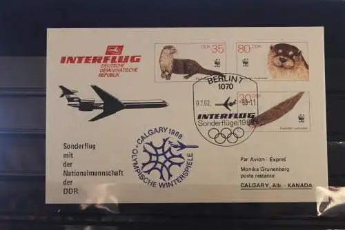 DDR  Interflug Sonderflug Berlin - Calgary 1988 mit der DDR-Nationalmannschaft;Amtl. Ganzsache mit Zudruck, WWF