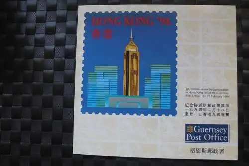 Guernsey Ausstellungsfolder zur HONG KONG '94 mit CEPT-Kleinbögen mit amtl. Zudruck