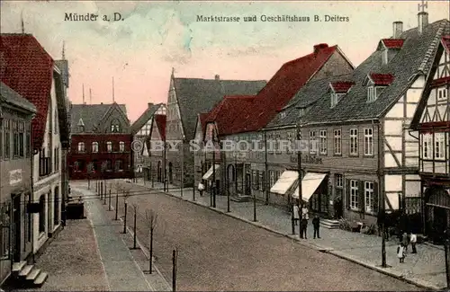 [Echtfotokarte farbig] Münder a. D., Marktstrasse und Geschäftshaus B. Deiters. 