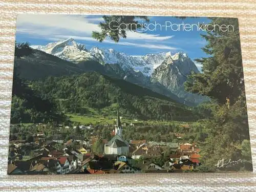 [Echtfotokarte farbig] Garmisch -Partenkirchen, gegen Zugspitzgruppe 2964 m. 
