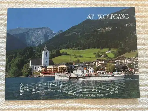 [Echtfotokarte farbig] St. Wolfgang, Notenband mit Liedtext
Rückseite: Im Weißen Rössl am Wolfgangsee,
Dort steht das Glück vor der Tür,
und ruft dir zu: "Guten Morgen,
tritt ein und vergiss deine Sorgen!
Und musst du dann einmal fort von...