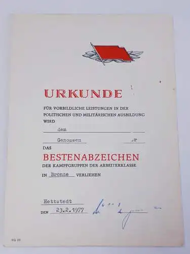 DDR Urkunde Kampfgruppen Bestenabzeichen in Bronze 1977