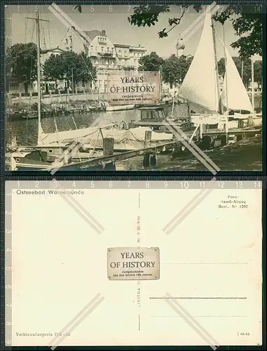 AK Ostseebad Warnemünde Straßenansicht Hafen Segelboote Leuchtturm und vieles