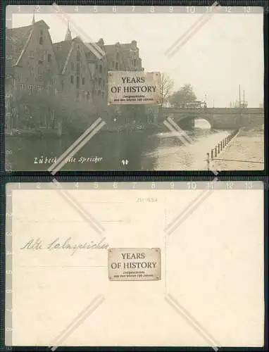 Foto AK Lübeck alter Speicher Brücke Straßenbahn 1910