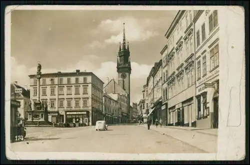 Foto AK Znojmo Znaim Südmähren Tschechien Kirche Geschäfte Straße Pkw um 1936