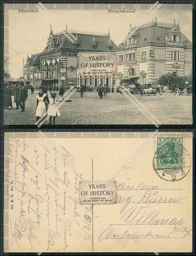 AK Düsseldorf Rhein Hauptbahnhof Droschken Autos Passanten Eingang 1915 gel.