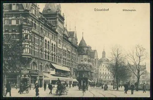 AK Düsseldorf am Rhein Wilhelmplatz Bahnhof Hotel Geschäfte Passanten 1925 gel.