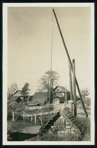 Foto AK Wehrmacht Russische Bauernhäuser, Ziehbrunnen 1942