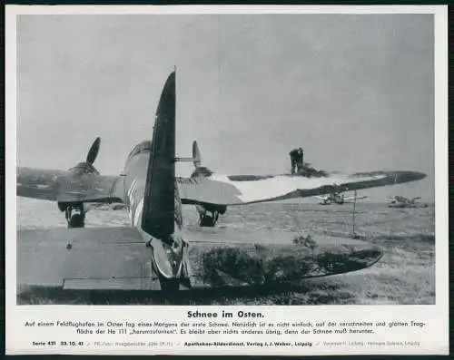 Apotheken-Bilderdienst -erster Schnee Russland Feldflughafen Flugzeug He 111 uvm