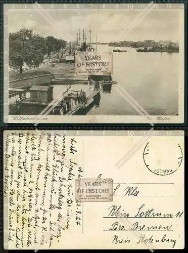 AK Wilhelmshaven 1927 gelaufen Kriegsschiff Boote im Hafen