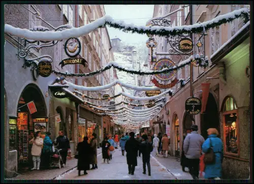 AK - Salzburg Getreidegasse Winter Schnee Menschen Geschäftsschilder Österreich