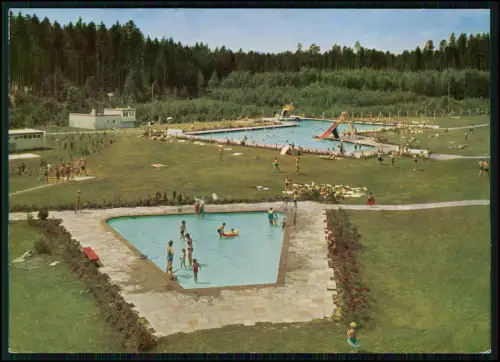Schwimmbad in Königsfeld im Schwarzwald Beckenanlage Liegewiesen und Sprungente