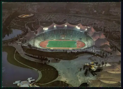 München Olympiapark Olympiastadion Olympische Spiele 1972 Nachtaufnahme Luftbild