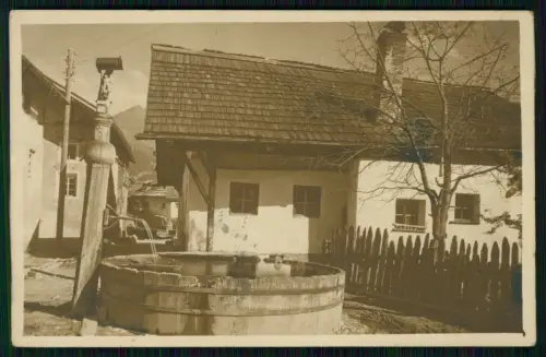Foto AK Landeck Serfaus Tirol - Oberinntal altes Haus Holzbrunnen  - 1920 gel.
