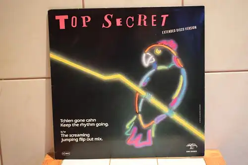 Top Secret  – Tchien Gone Cahn Keep The Rhythm Going. Extended Disco Version b/w The Screaming Jumping Flip Out Mix.
