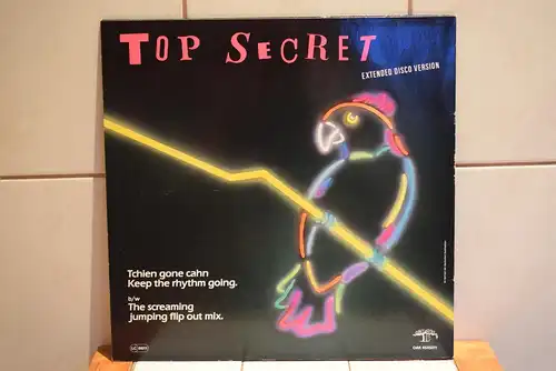 Top Secret  – Tchien Gone Cahn Keep The Rhythm Going. Extended Disco Version b/w The Screaming Jumping Flip Out Mix.