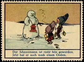 Ordensverleihung von Zwergen für den Schneemann