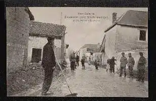 St. Hilaire petit. Französische Einannt. ner beim Straßenreinigen im.