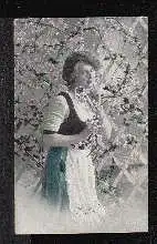 Frau mit Blumen. Foto coloriert.