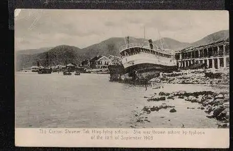 Typhoon. The Canton Steamer Tak Hing lying ashore