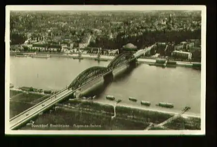 x00084; Düsseldorf. Rheinbrücke. Flugzeugaufnahme.