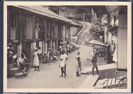 AK Lambarene: Blick in die Gasse zwischen den Krankenhütten 1956