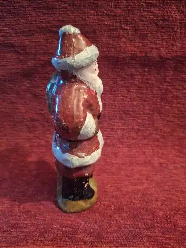 Alte Massefigur Weihnachtsmann mit Sack auf dem Rücken 13cm hoch