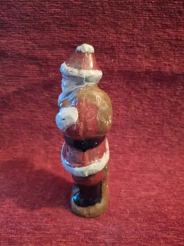 Alte Massefigur Weihnachtsmann mit Sack auf dem Rücken 13cm hoch