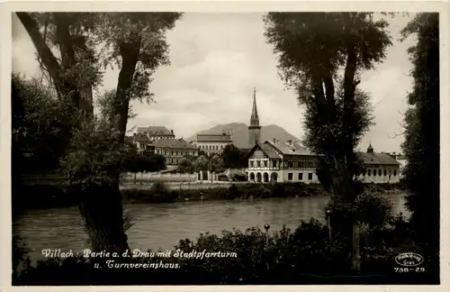 Villach, Partie an der Drau mit stadtpfarrturm -346624